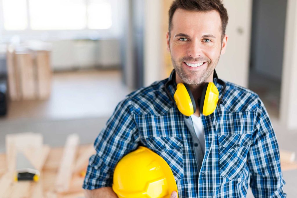 smiling contractor with hardhat